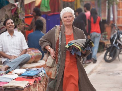 Dame Judi Dench says 'Tomorrow Never Dies' was her most challenging Bond film and that she 'loathes' being called a 'national treasure'