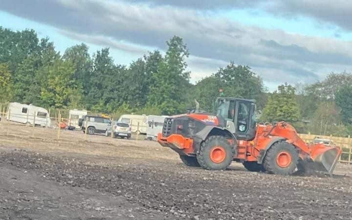Hardcore, fencing and septic tanks already installed at the paddock in Hillam, North Yorkshire, where two families in the village have since seen house sales collapse after dozens of caravans moved onto the site.
