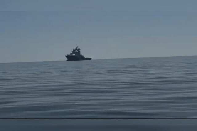 An overcrowded dinghy carrying around 50 migrants, escorted by four French lifeboats and a tugboat, after a separate dinghy reached Folkestone undetected on Monday.