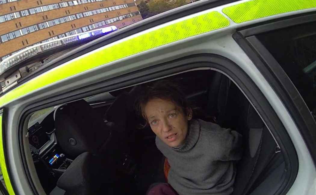 Charley Wright in a police vehicle following her arrest, after she admitted assaulting a police officer while in custody in addition to the racially aggravated offences.