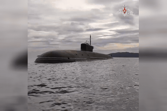 A Bulava intercontinental ballistic missile launches from a submerged submarine in the Sea of Okhotsk — a weapon Russia's Defence Ministry confirmed successfully reached its designated target, with warheads 100 times…