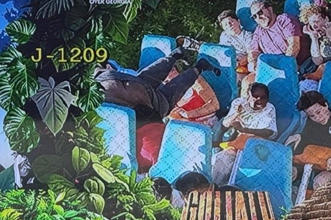 Footage of the man falling from the Goliath roller coaster, which would rank as at least the seventh fatality on record at Six Flags Over Georgia.