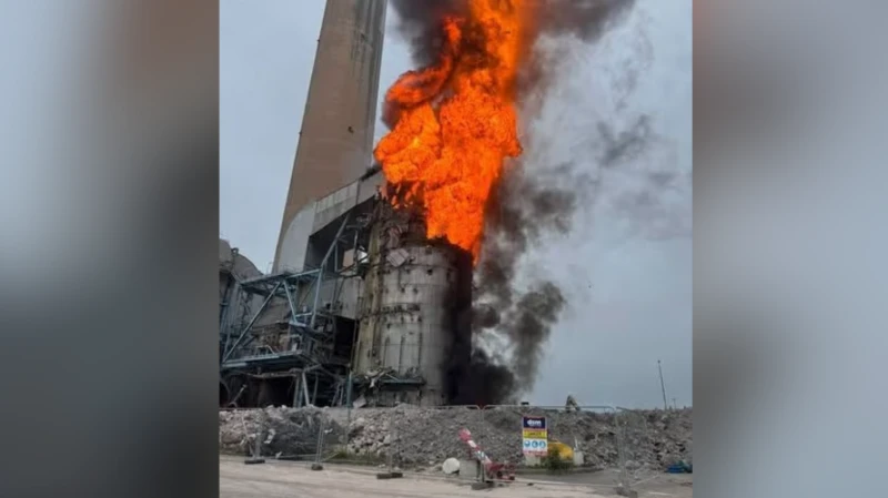 Firefighters from 11 stations tackle a major blaze at the decommissioned Fiddler's Ferry power station, with residents near the Warrington site advised to keep windows and doors closed.