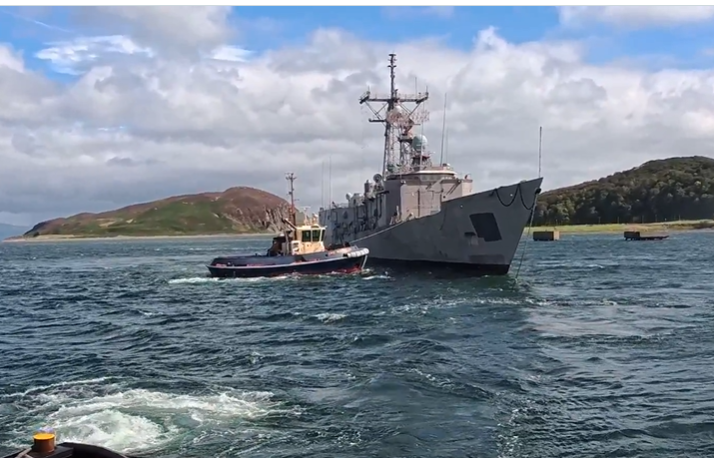 The USS Klakring under tow off the Outer Hebrides before the exercise in which it became the first actual target struck by a Sea Venom missile fired live from a Royal Navy Wildcat helicopter.