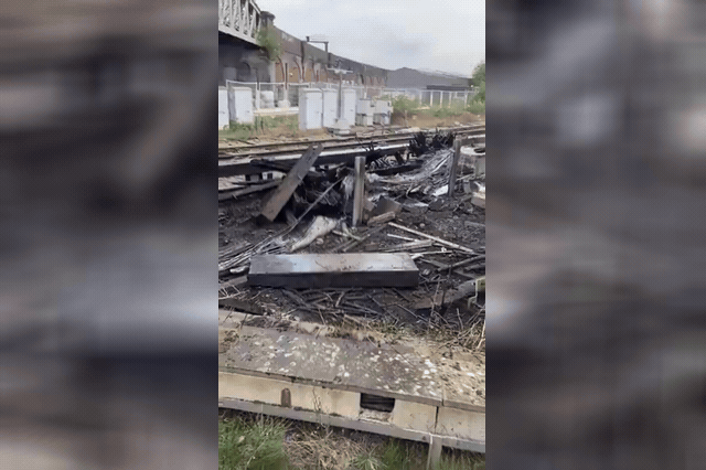 Firefighters tackle the trackside blaze near Clapham Junction. Rail services remained disrupted with delays of up to 30 minutes after a similar fire between Gatwick Airport and Purley.