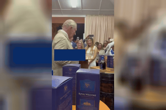 A glass of 'Royal Welcome' rum, created in King Charles's honour and sampled by him at State House in Georgetown, as a small number of protesters held "pay us what you owe us" placards at several events during his…