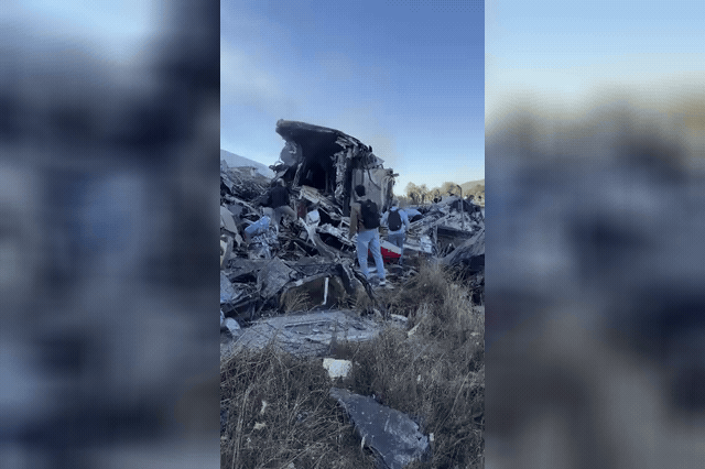Smoke rises from derailed carriages between Los Yébenes and Urda after the crash, which emergency crews feared could surpass the Adamuz disaster, where 46 people died in January.
