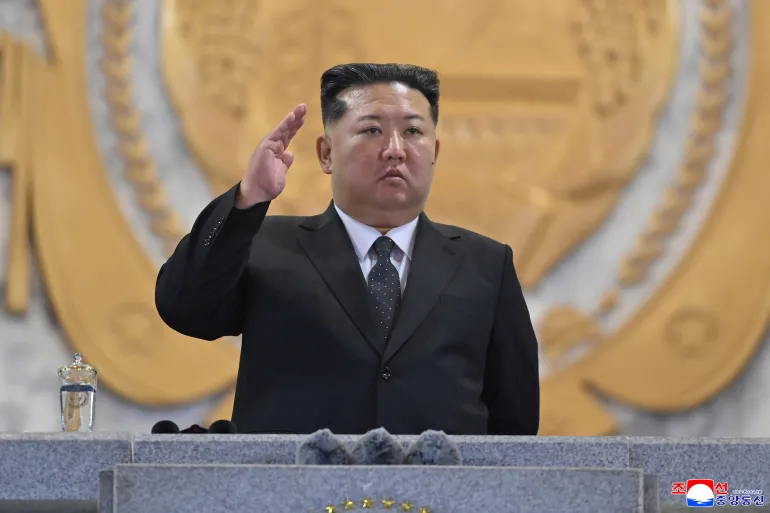 North Korea releases 'proof of life' photos of Kim Jong Un inspecting a pink shoe after claims he died