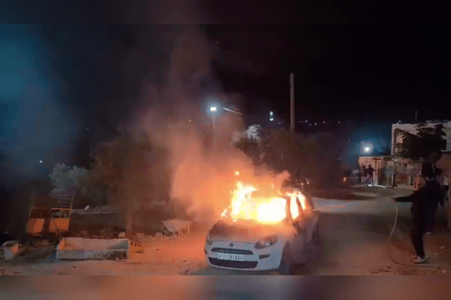Dozens of extremist Jewish settlers clash with Israeli military and border police forces in the Palestinian village of Jalud, where the al-Tubasi family was being escorted home under a High Court order.