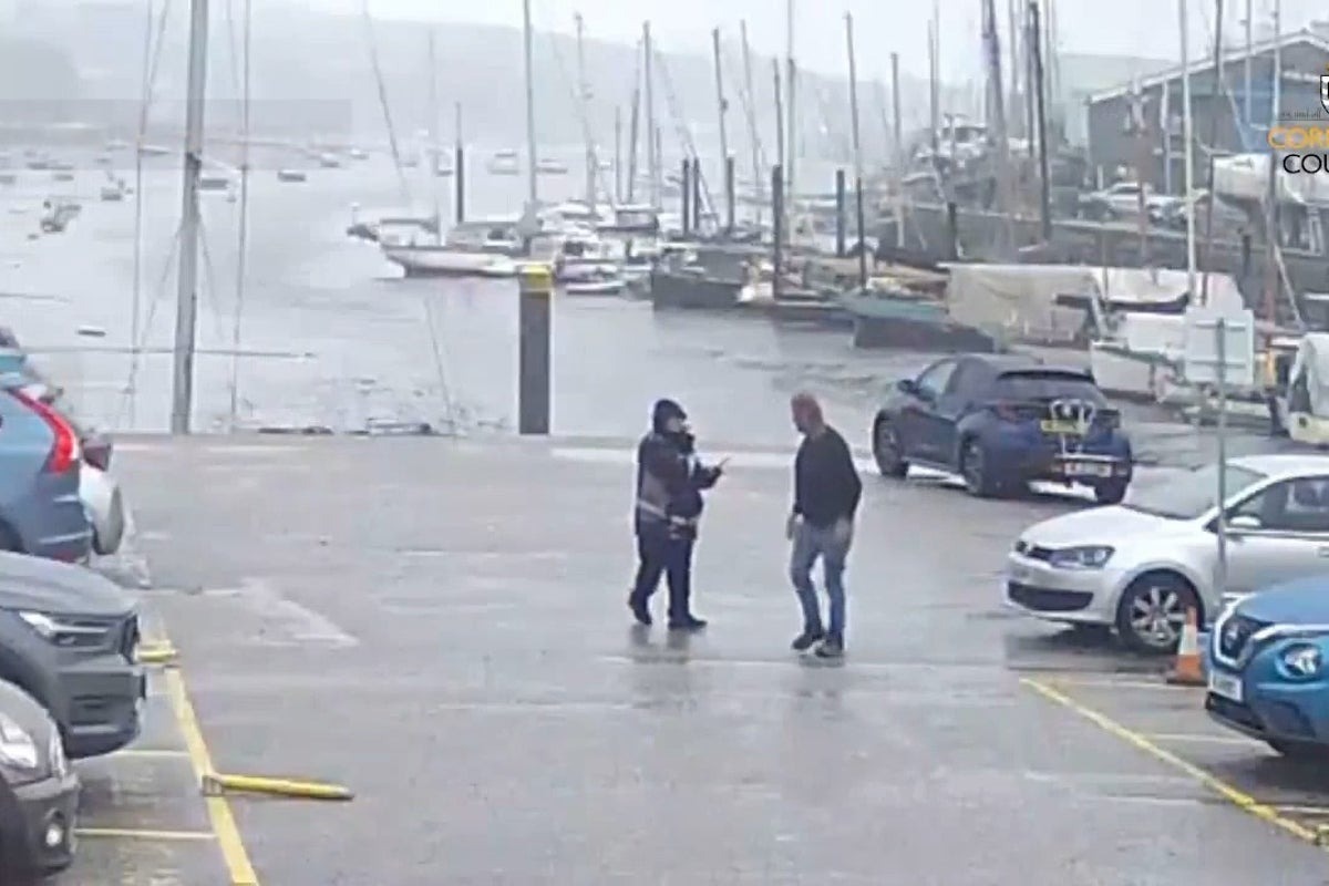 Stephen Lang, 58, crumples a parking notice on body-worn camera at Exchequer Quay car park in Penryn — he was convicted in his absence and ordered to pay £2,270, including £1,920.90 in costs.