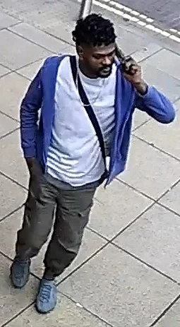 British Transport Police released this CCTV handout image of a man they want to trace in connection with the sexual assault of a sleeping woman on a Manchester to Peterborough train.