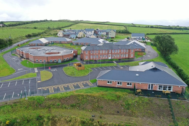 Ger-y-Nant retirement complex in Bridgend, where a 61-year-old man was later found barricaded in his room and arrested on suspicion of murder.