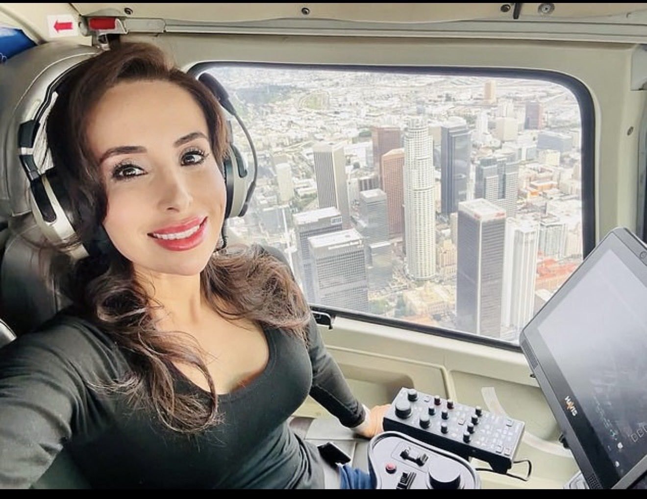 NBC4's NewsChopper 4 over downtown Los Angeles. Investigators probing the fatal Chatsworth crash have reportedly found drugs in an SUV near the scene and are examining a "dead man's curve" flight theory.