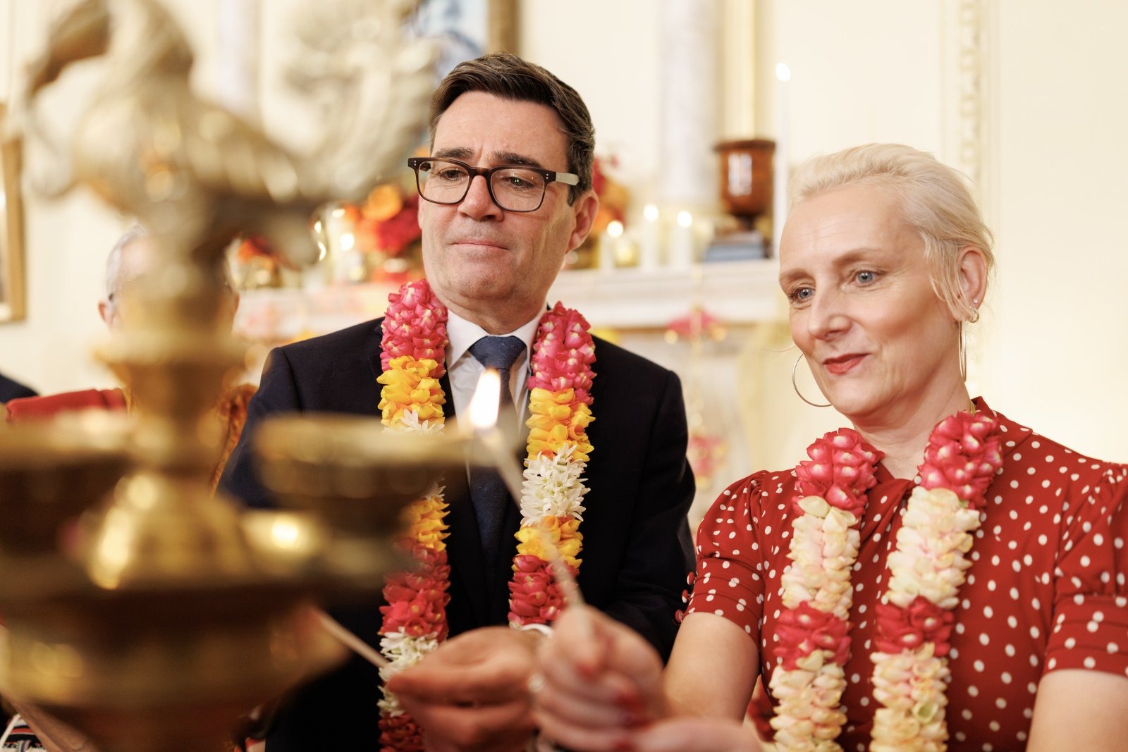 Andy Burnham with his wife, Marie-France van Heel, at a Diwali celebration at 10 Downing Street, as Chancellor John Healey deepened a cabinet split by saying he does not expect Britain to rejoin the EU in his lifetime.