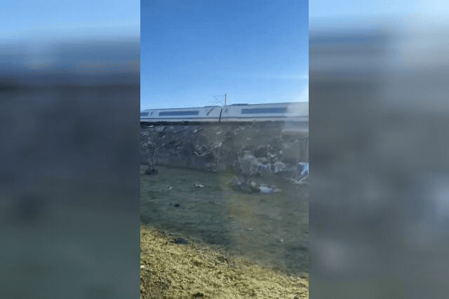 Mangled wreckage on its side after two high-speed trains collided in Toledo province, Spain, killing at least 39 people and leaving survivors scrambling clear while passengers remained trapped.