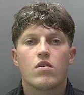 Samuel Powell, who denied dangerous driving but was convicted after a two-day trial, in a police custody photograph.