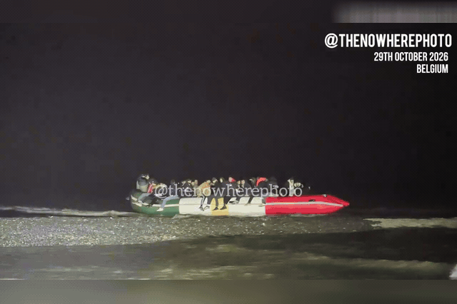 A custom-made dinghy bearing Kurdish flag colours is pushed out to sea off De Panne beach, Belgium, as Belgian officers watched without intervening — one of 33 boat departures the country logged this year before…