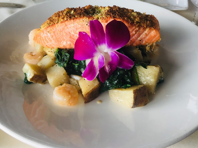 sliced bread with sliced vegetables on white ceramic plate