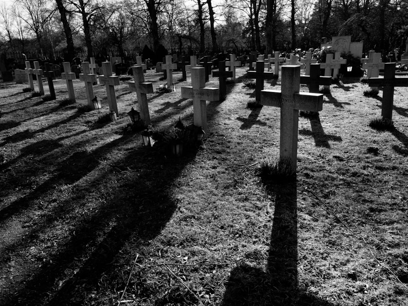 Master of Puppets A graveyard in Solna, Sweden. Cross with backlight.