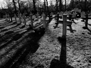 Master of Puppets A graveyard in Solna, Sweden. Cross with backlight.