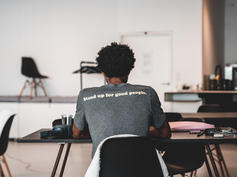 Stand up for good people! A motivational line on the back of a coworker. 