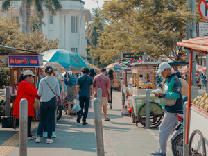 Street vendors and people are bustling.