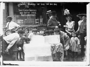 Licking blocks of ice on hot day. Circa 1910 by Bain News Service, publisher. https://www.loc.gov/resource/ggbain.09814/