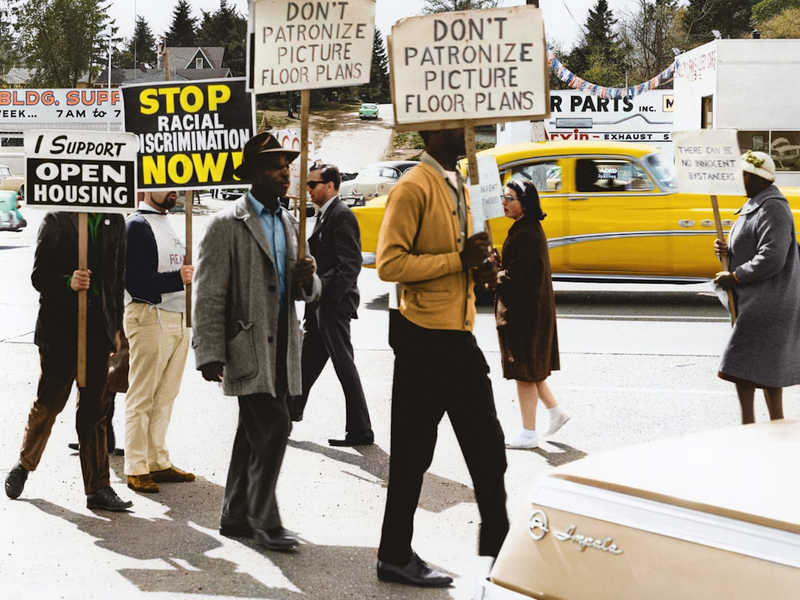 Caption reads, "CORE-sponsored demonstration at realtor office of Picture Floor Plans, Inc." Original black and white negative by the Seattle Police Department. Taken May 4th, 1964, Seattle, Washington State, United States (Seattle Municipal Archives). Colorized by Jordan J. Lloyd. Seattle Municipal Archives Series 5210-01: Records of the Office of the Mayor, 1956-1970 http://archives.seattle.gov/digital-collections/index.php/Detail/objects/102614