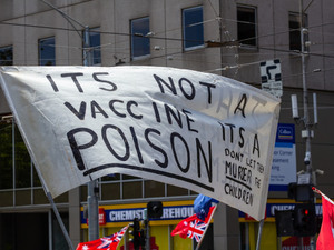 A sign at Melbourne's Freedom protests rally and march in the city November 20th 2021 - over 200,000 people marched from Parliament to the Flagstaff Gardens. A happy family friendly crowd singing and chanting "Kill The Bill" and "Sack Dan Andrews"