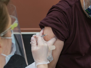Patient receives Covid-19 vaccine shot