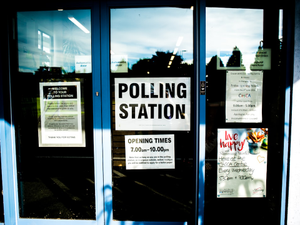 Polling station sign door