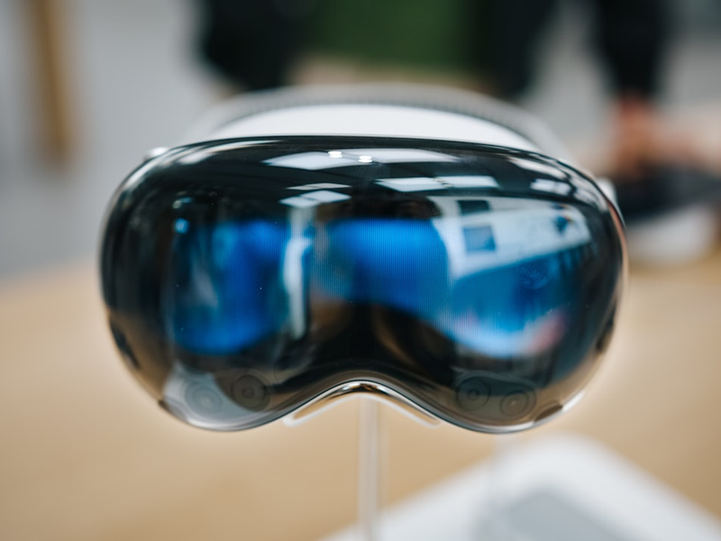 Close-up of Apple Vision Pro on front display on a blurred background
