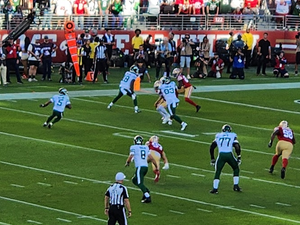 Game action scramble near the goal line.