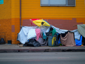 A group of tents sitting on the side of a road