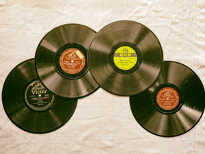 A friend brought over a number of his old 78rpm records in the original sleeve books that people collected way back. So fun to capture and try to get a vintage look on the images.