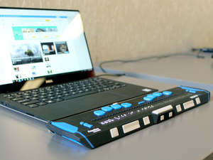 A computer with a refreshable braille display.