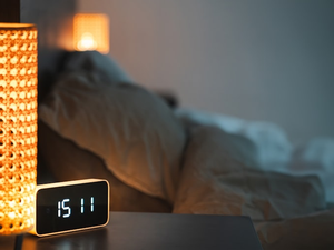 Smart home bedroom. Night clock.