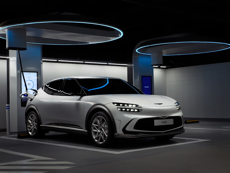 Genesis GV60 is charging at EV charging station