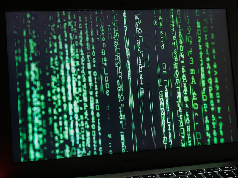 IT security matrix screen on a macbook pro. Ideal image for use onwebsites about internet security, hackers and firewalls.