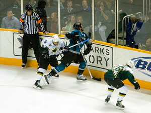 Joe Thornton gets a high stick
