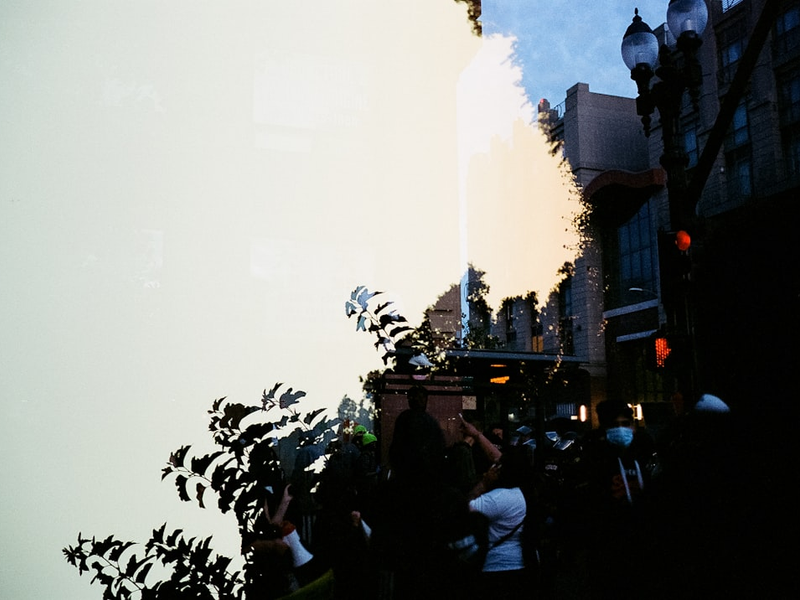 Double exposure featuring a protest in Oakland shot on fuji superia 400 35mm film
