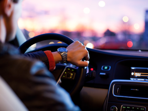 Hand on steering wheel
