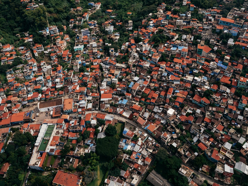 an aerial view of a city with lots of houses