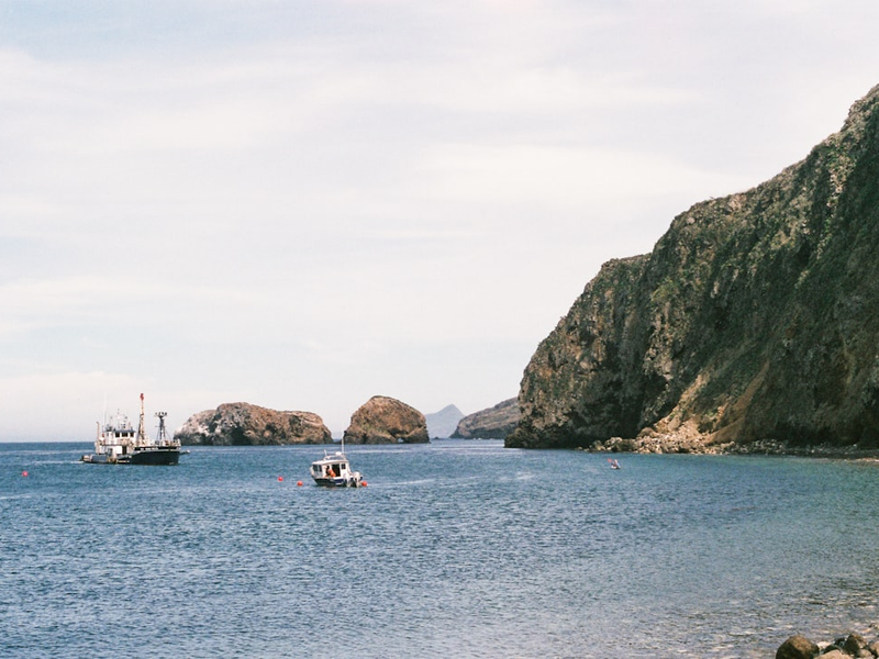 Beautiful view of boats, the sea and rocks while hiking the Channel Islands off the coast of Ventura, CA.