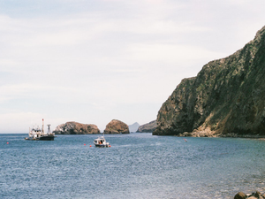 Beautiful view of boats, the sea and rocks while hiking the Channel Islands off the coast of Ventura, CA.