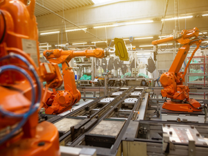 Automatic robots in the industrial factory for assembly automotive products, automotive concept
