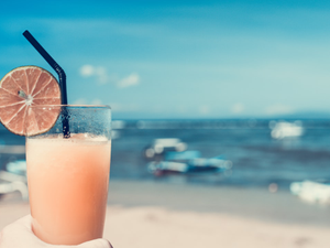 A glass of fresh and cold orange juice