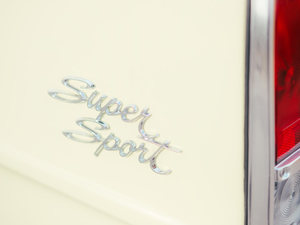 a close up of the rear end of a classic car