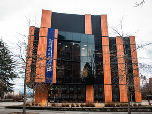 The Bill & Melinda Gates Center for Computer Science & Engineering at the University of Washington in Seattle seamlessly blends modern design with elements of the Spanish Mediterranean style found in other campus buildings. Opened in 2019, this 135,000-square-foot complex, designed by LMN Architects, features a cast limestone and Texas brick exterior, large windows, and colorful soffits, echoing the university's architectural heritage. The center houses state-of-the-art research labs, classrooms, and collaborative spaces, fostering innovation in computer science and engineering.