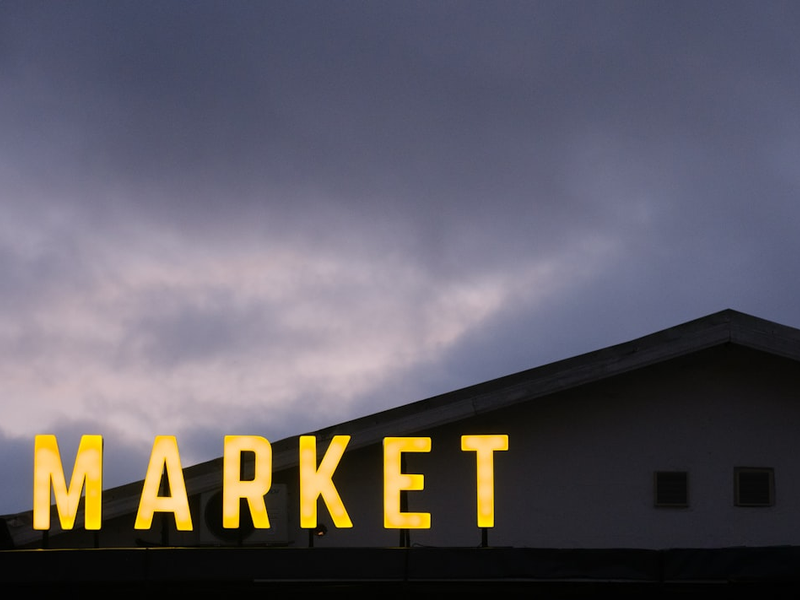 A sign that reads market on top of a building